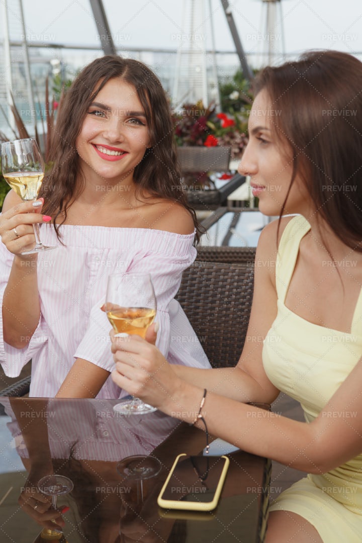 Young Women Drinking Wine: Stock Photos