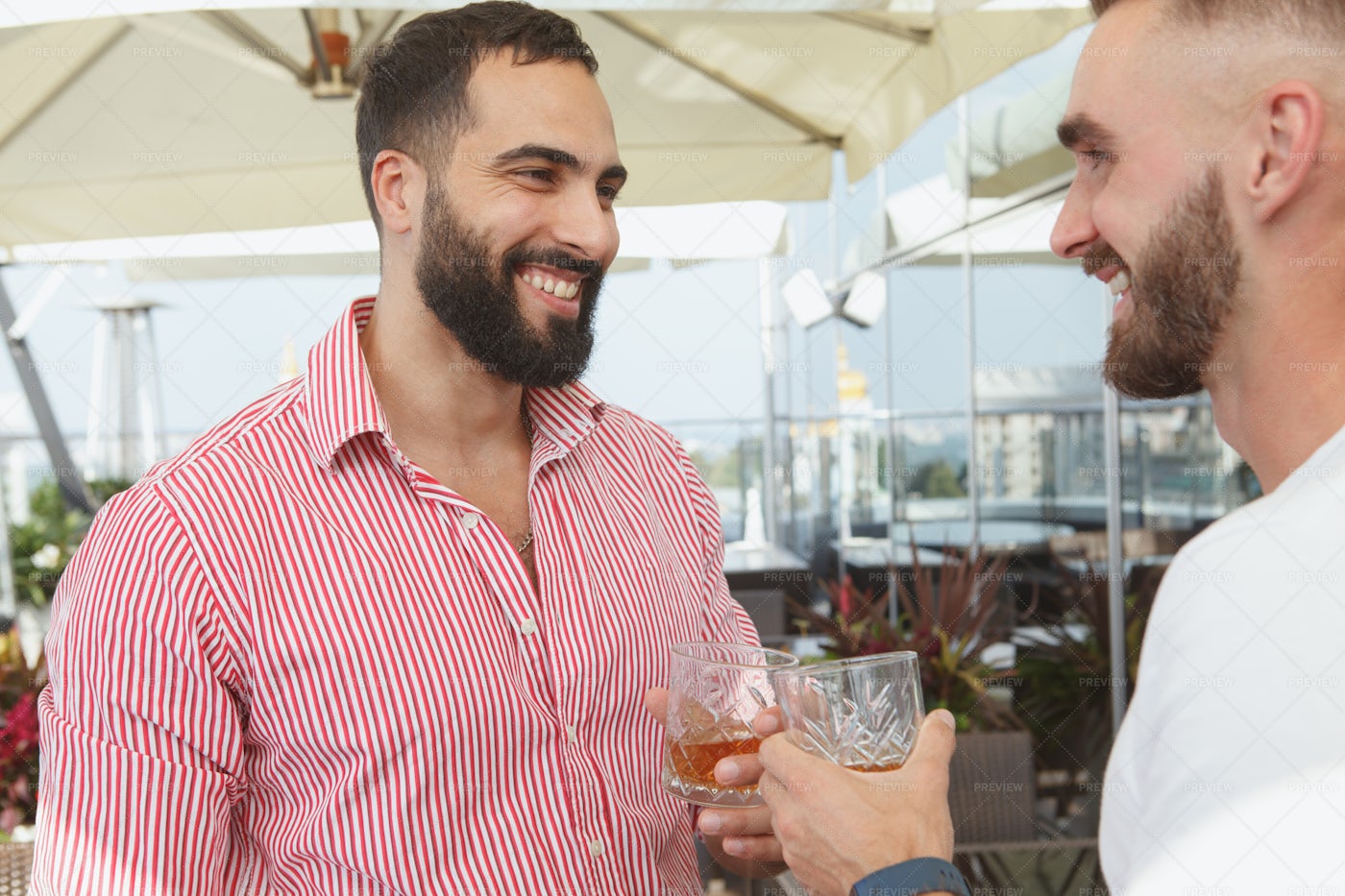 Man Having Drinks With His Friend: Stock Photos