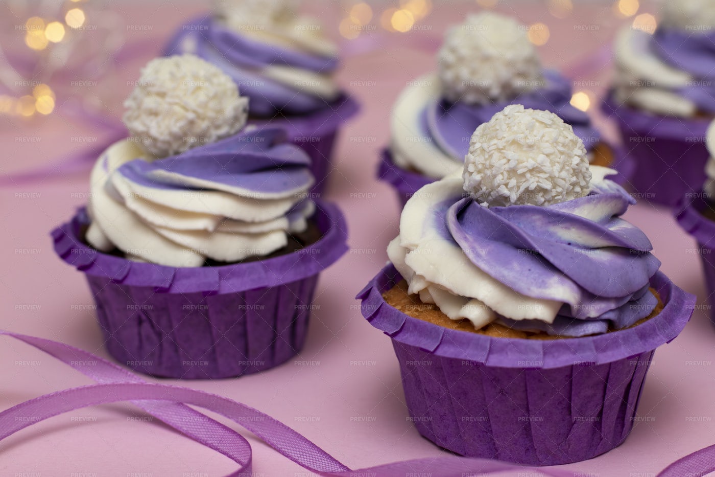 Cupcakes With Lilac Cream: Stock Photos
