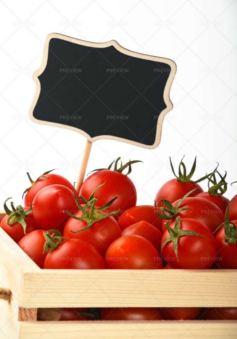 Tomatoes With A Price Sign: Stock Photos