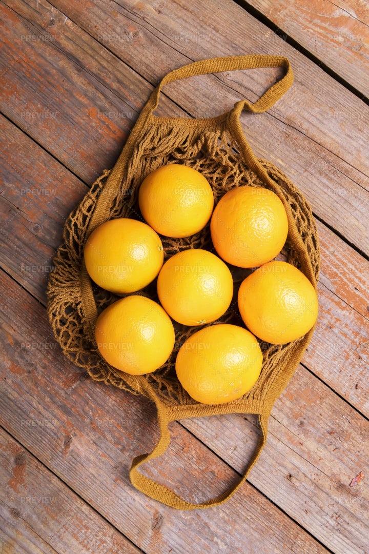 Oranges In String Bag: Stock Photos