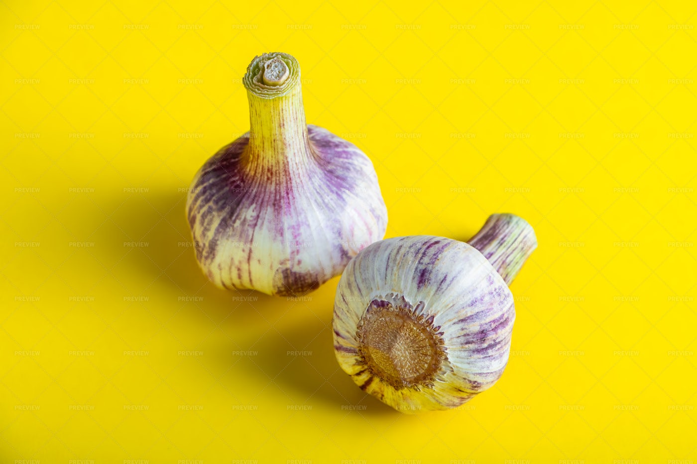 Garlic On Yellow: Stock Photos