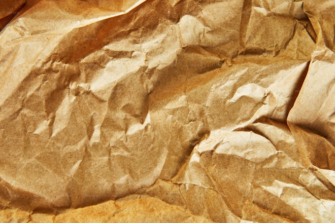 Crumpled brown parchment paper, close up Stock Photo by ndanko