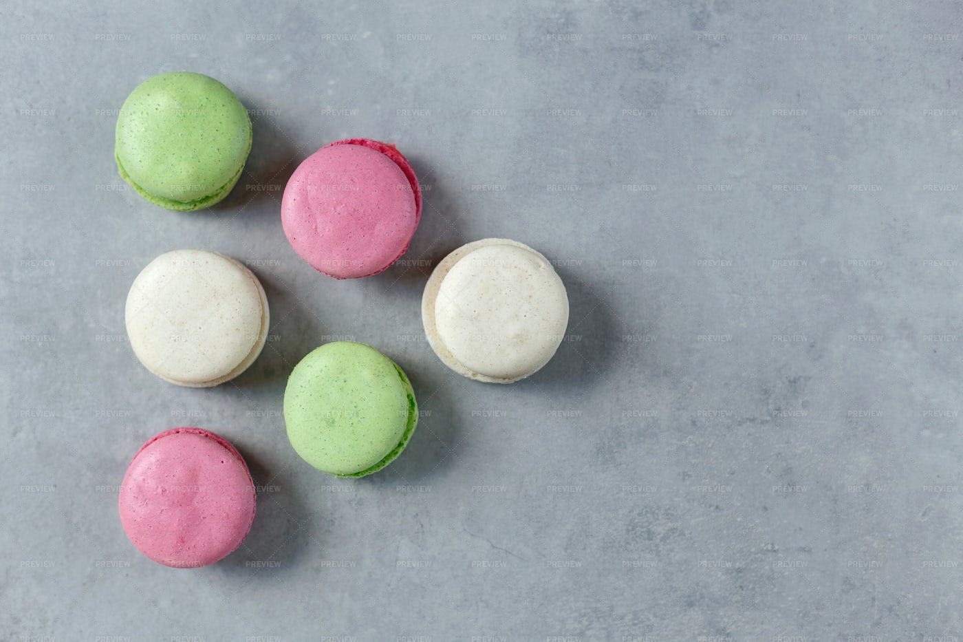 Six Macarons On Gray: Stock Photos