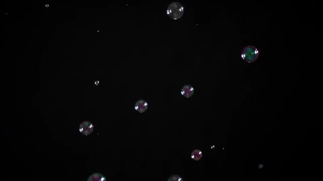Soap Bubbles On Black Background: Stock Video