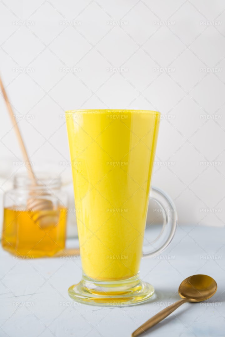 Golden Turmeric Latte And Honey: Stock Photos