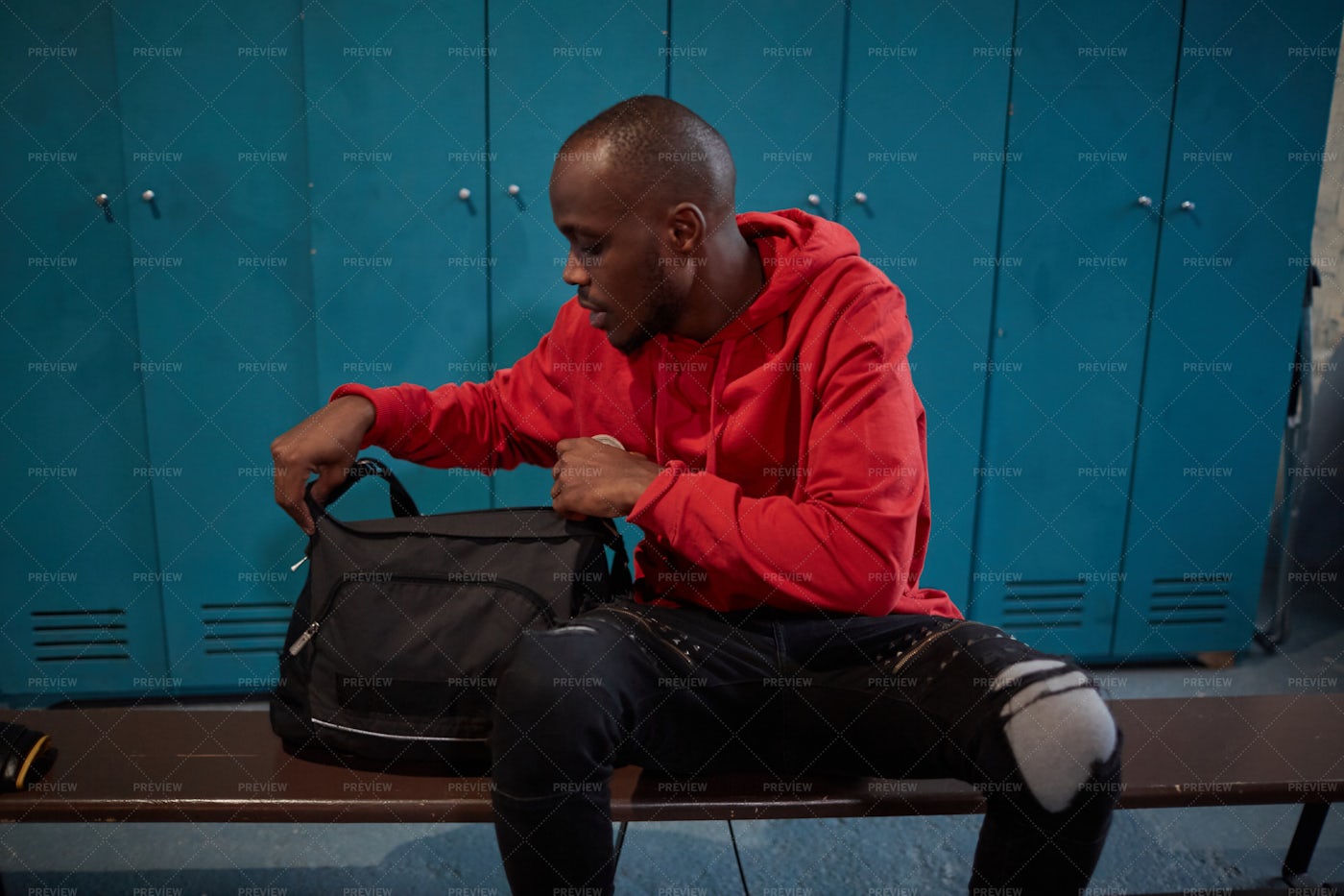 Man With Bag In Locker Room: Stock Photos