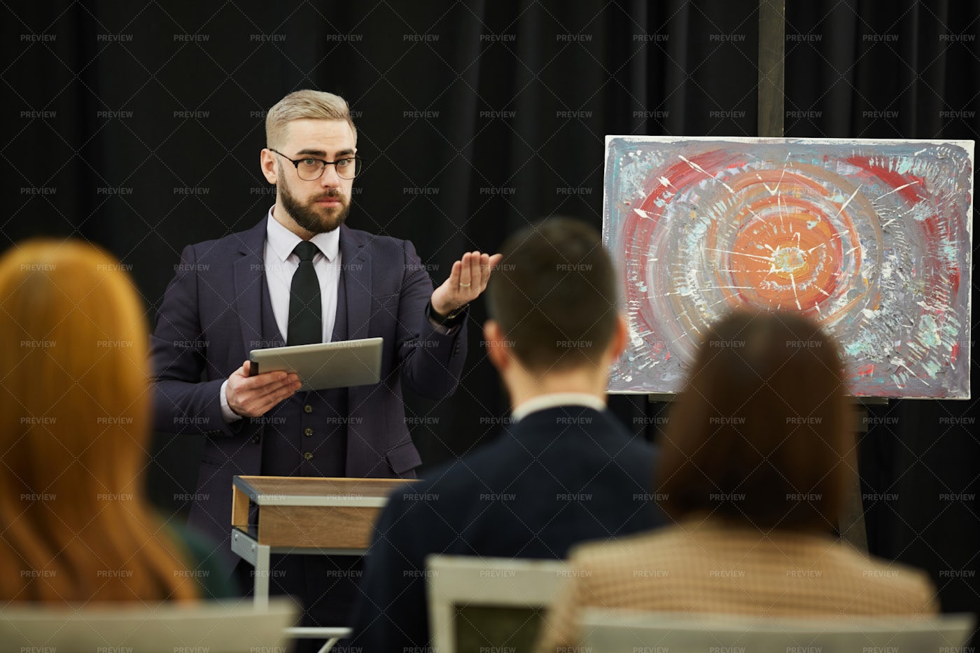 Auctioning Off A Painting: Stock Photos