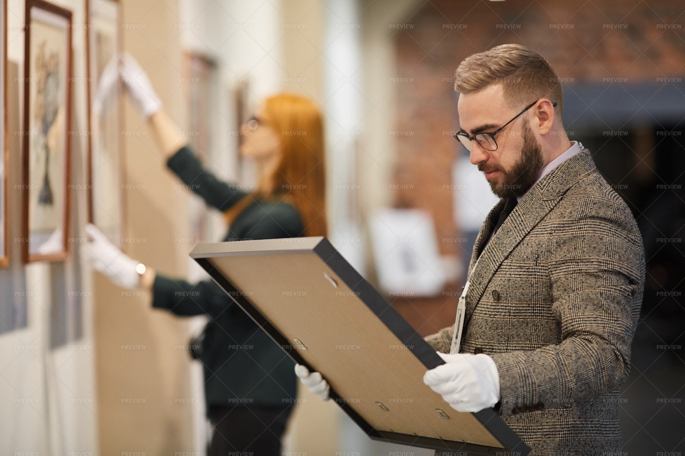 People Preparing For Exhibition: Stock Photos
