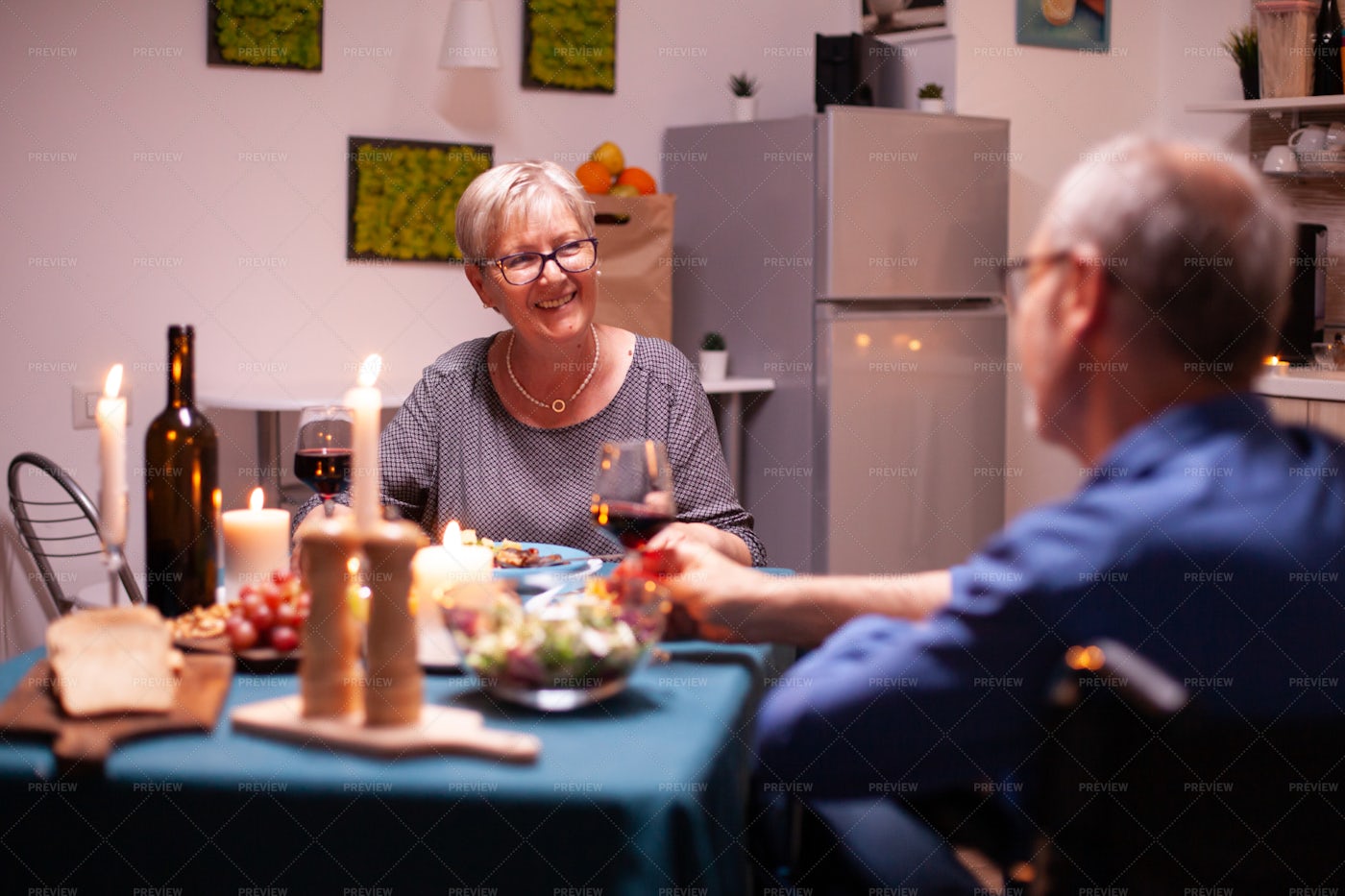 Smiling At Her Husband At Dinner: Stock Photos