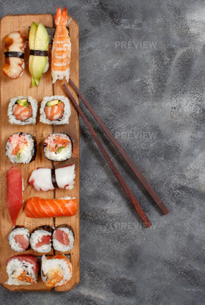 Various sushi sets top view Stock Photo by ©kamranaydinov 345408858