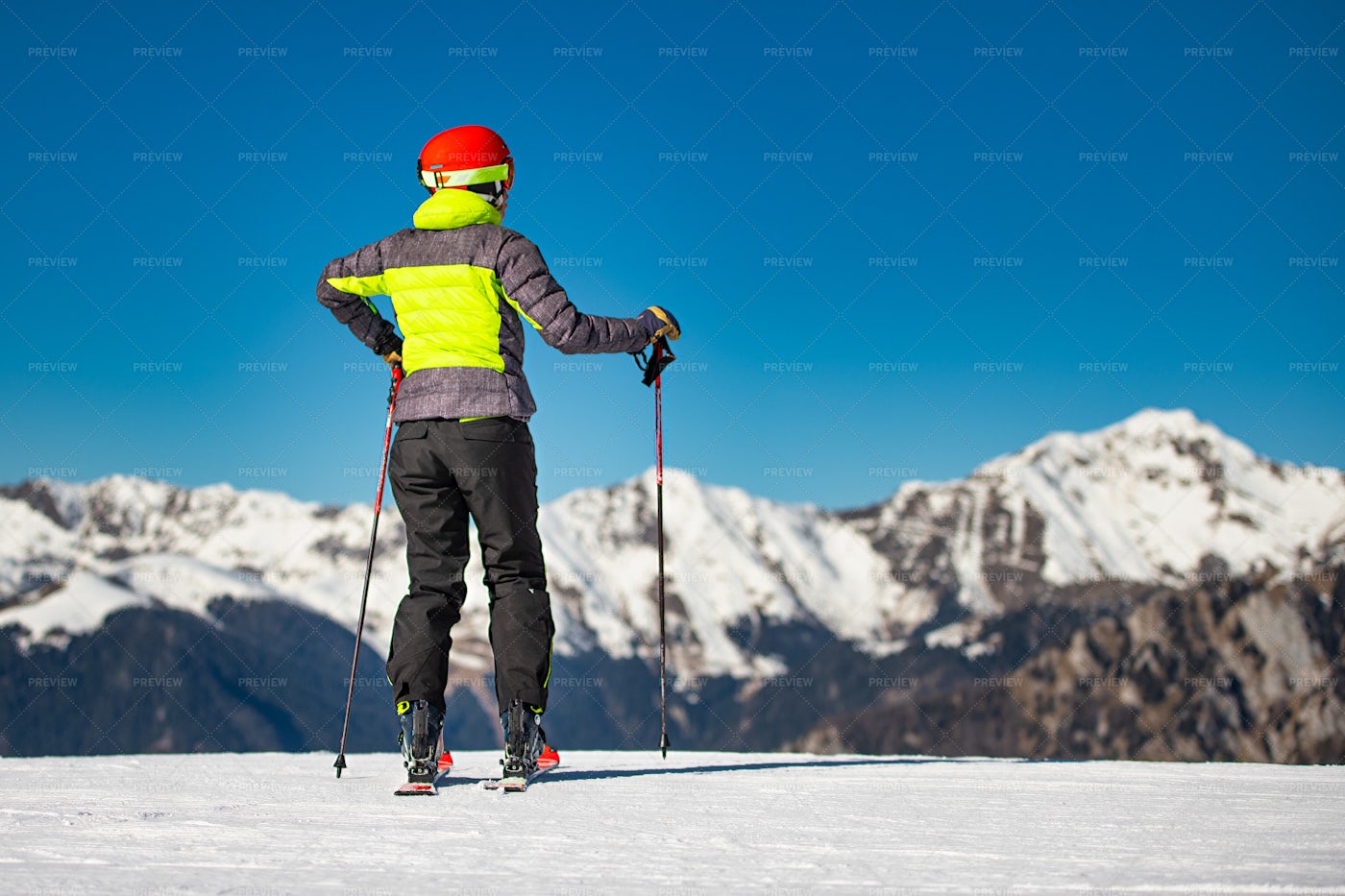 Skier Looking At Mountains: Stock Photos