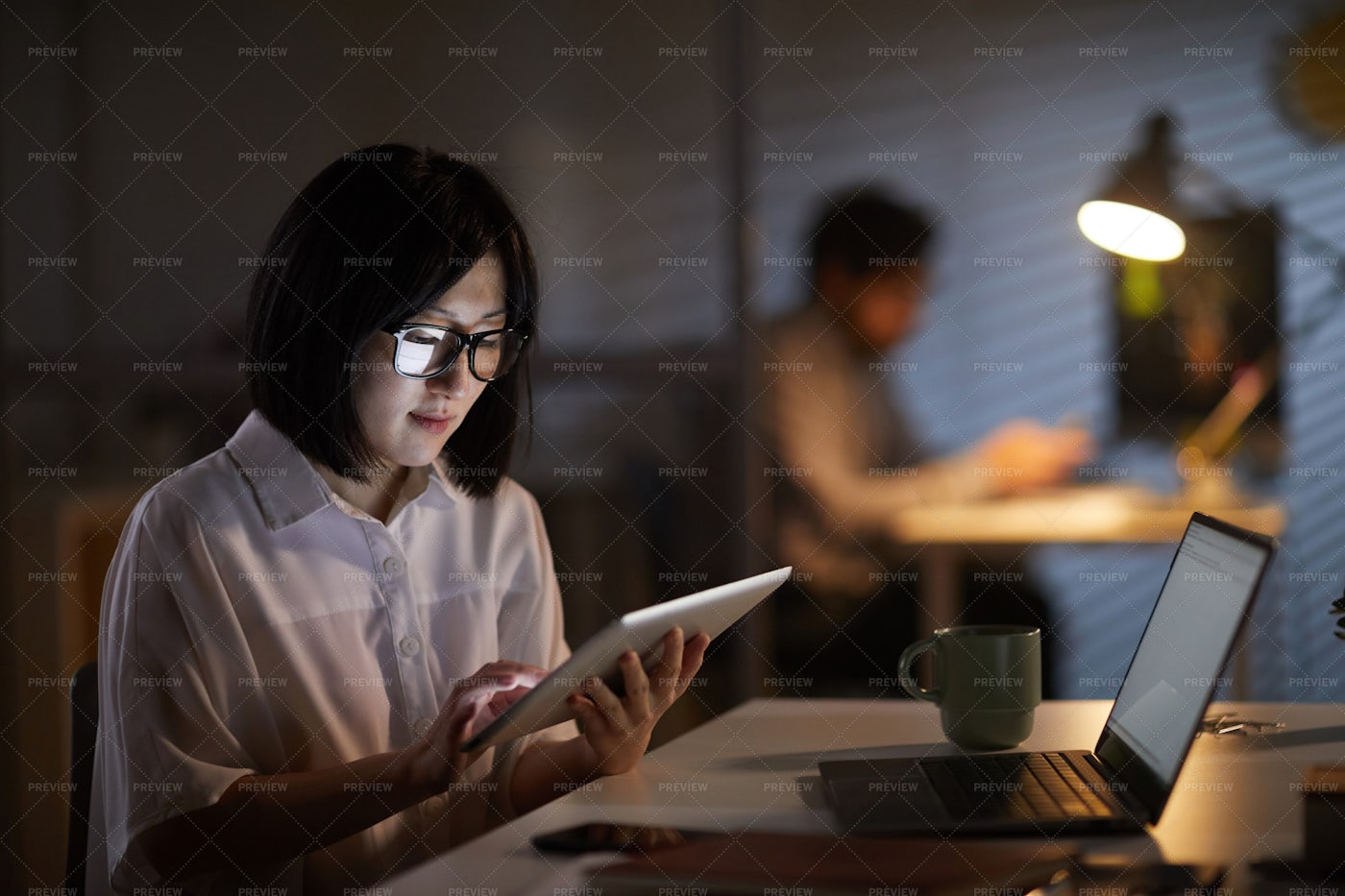 Businesswoman Working On A Tablet: Stock Photos
