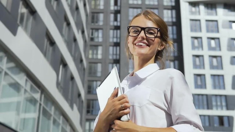 Smiling Businesswoman With A Tablet : Stock Video