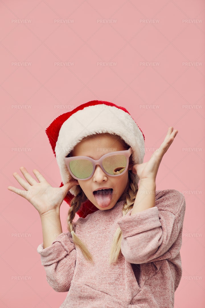 Funny Girl In Santa Hat: Stock Photos