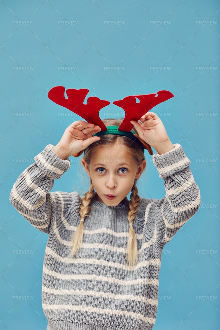 Wearing Deer Antlers: Stock Photos