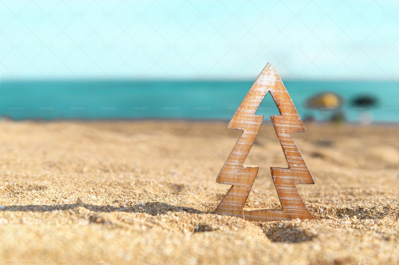 Wood Christmas Decoration On The Beach: Stock Photos