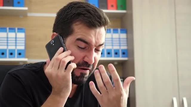 Angry Businessman Screaming At Caller: Stock Video