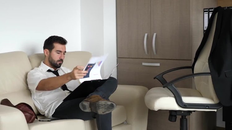 Businessman Writing On Notebook: Stock Video