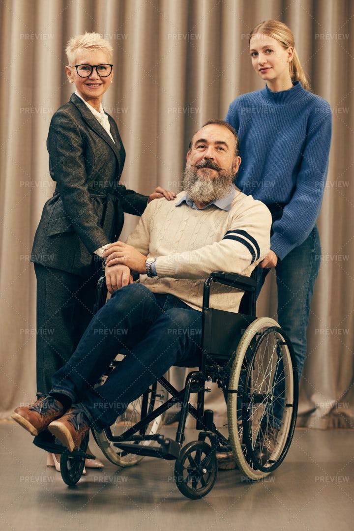 Disabled Man With Family: Stock Photos