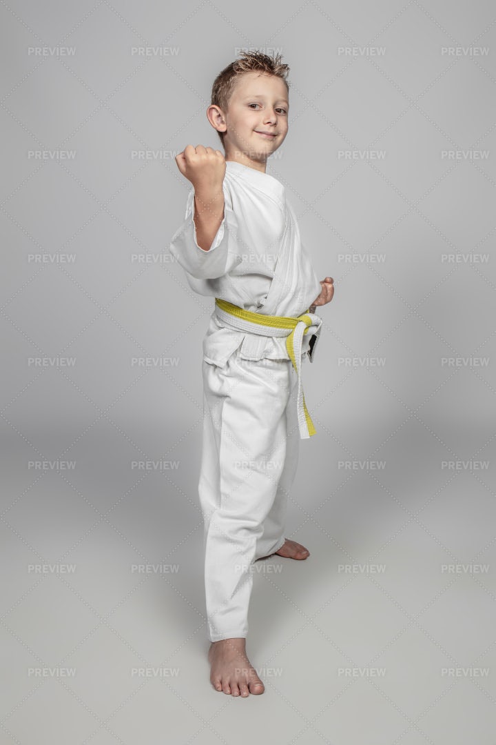 Smiling Child Practicing Martial Arts: Stock Photos
