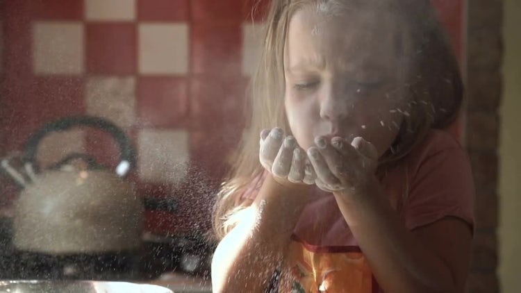 Young Girl Blowing White Flour : Stock Video