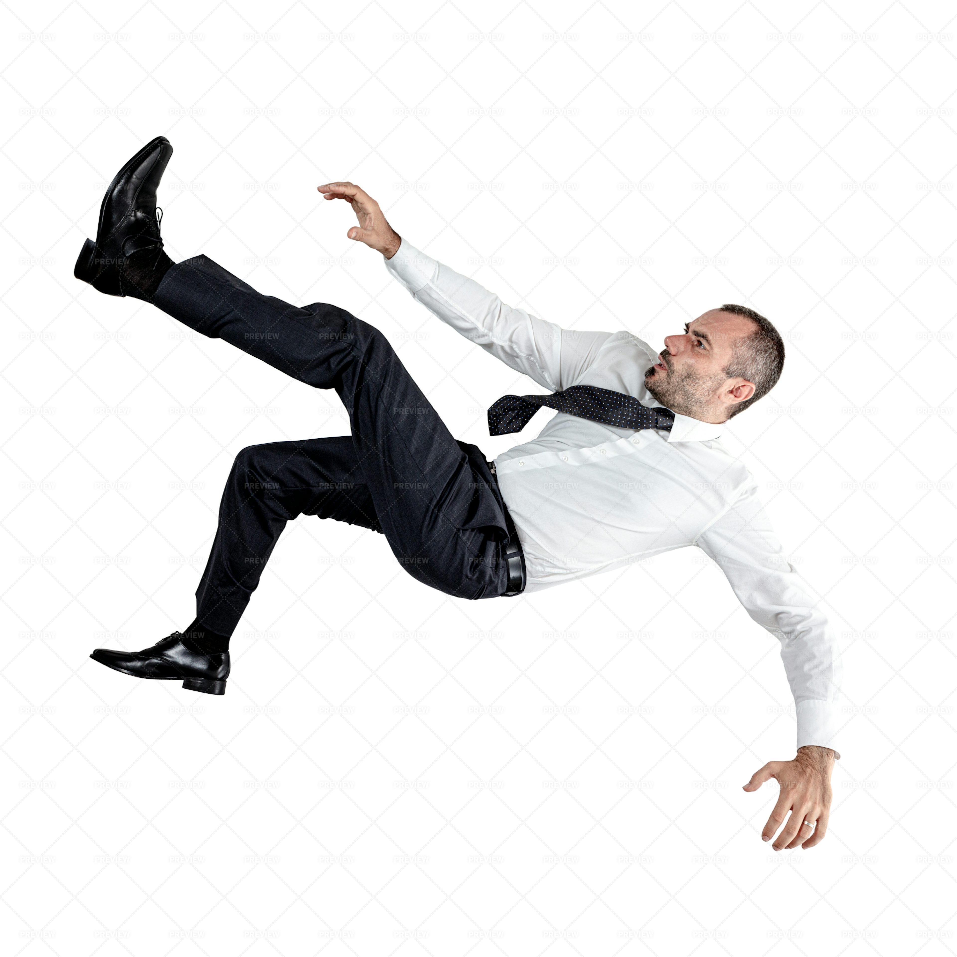 Businessman Falling Down - Stock Photos | Motion Array