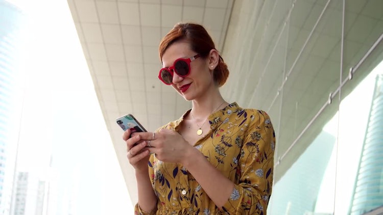 Woman Reading Text On Smartphone : Stock Video