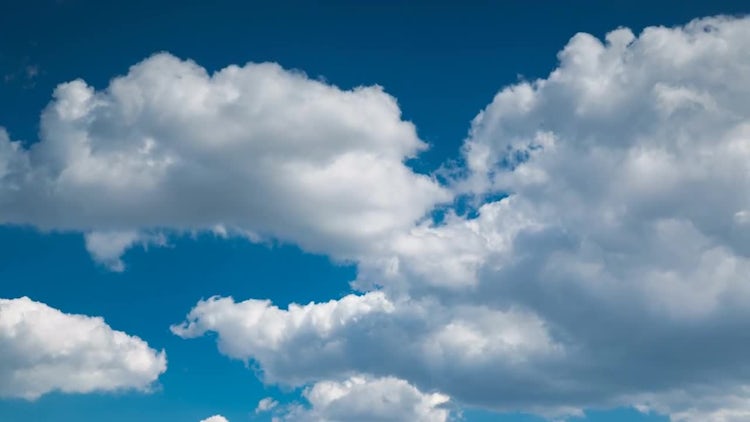 Cumulus Clouds Swirling Underneath Sky: Stock Video