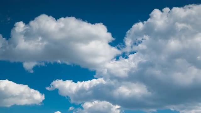Cumulus Clouds Swirling Underneath Sky: Stock Video