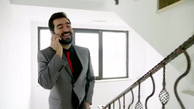 Businessman Takes Call On Stairs: Stock Video