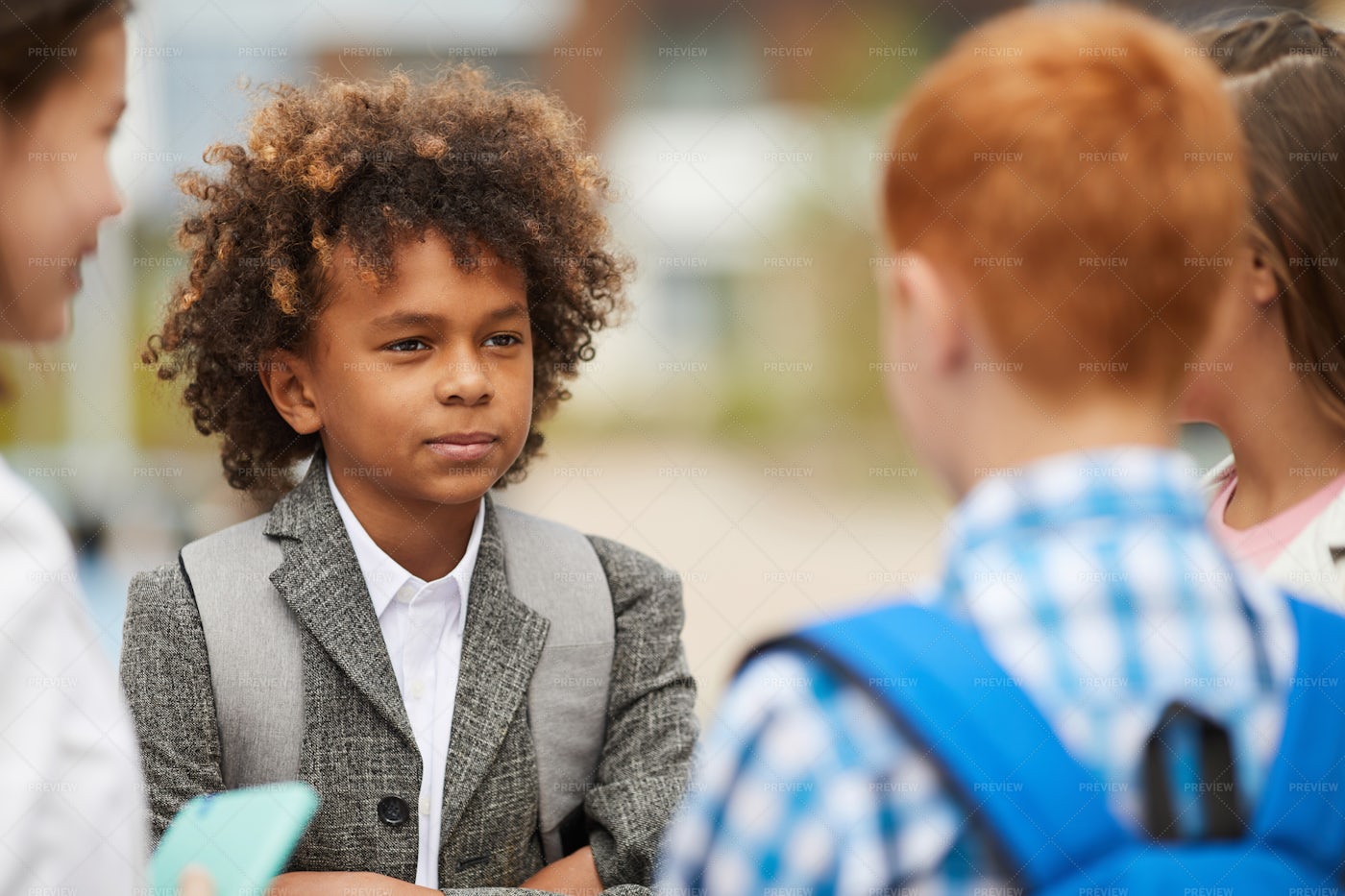 He is among his classmates