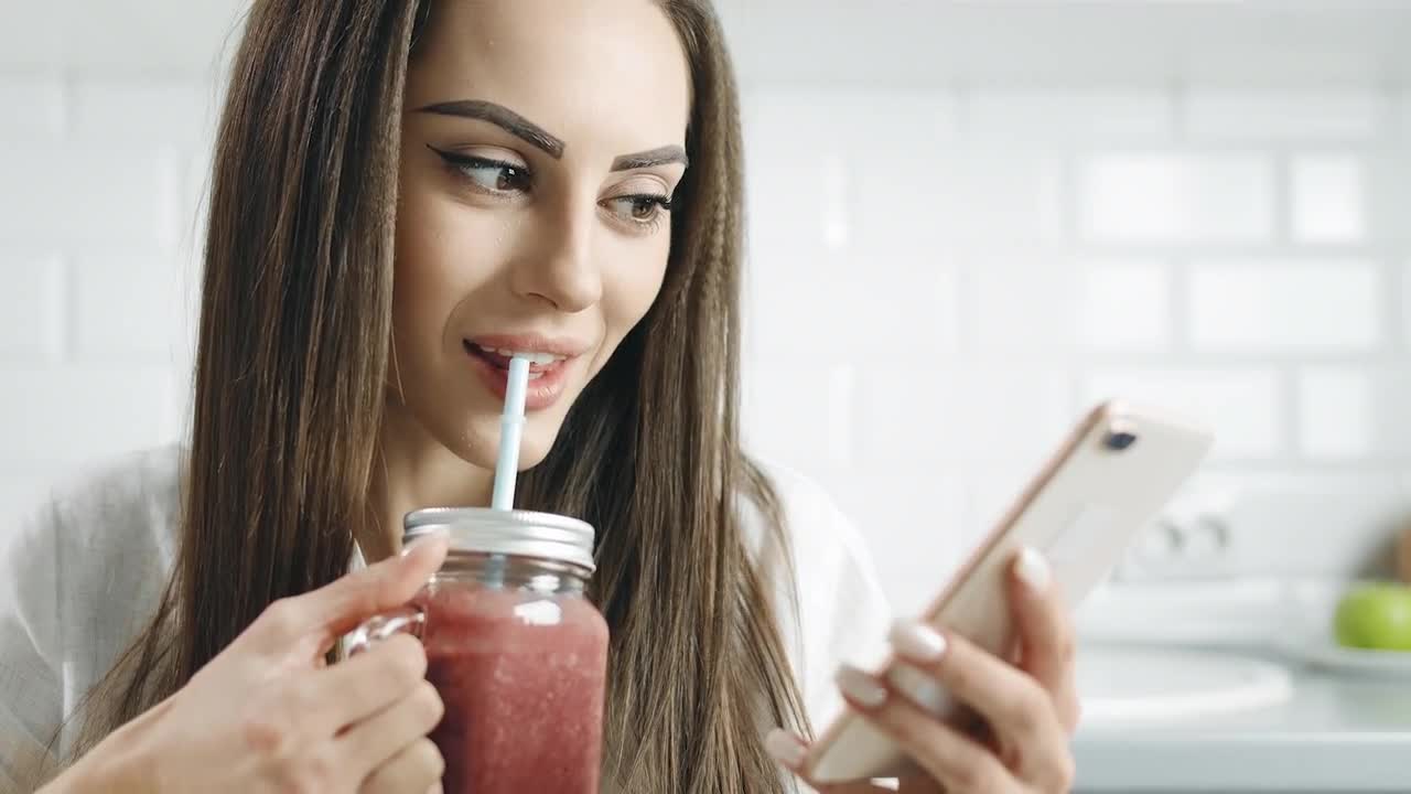 Woman Drinking Smoothie Stock Video Motion Array 