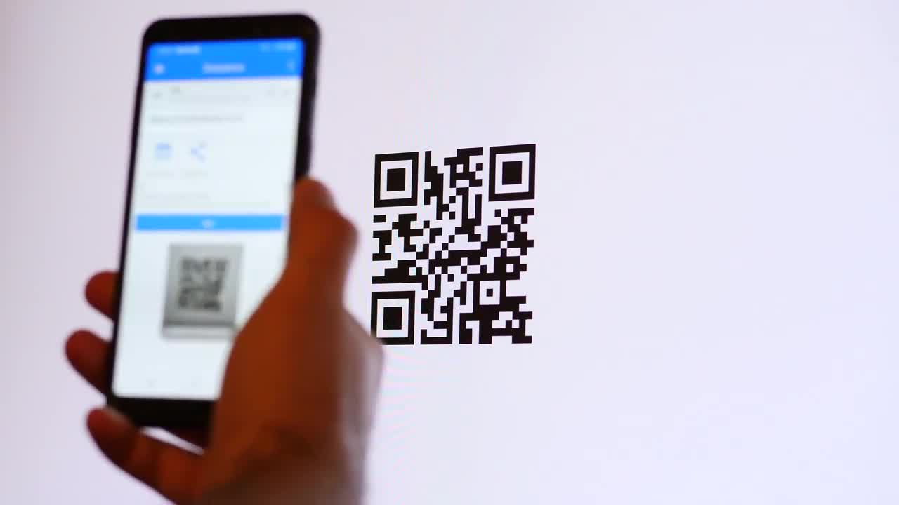 Scanning A QR Code - Stock Video | Motion Array