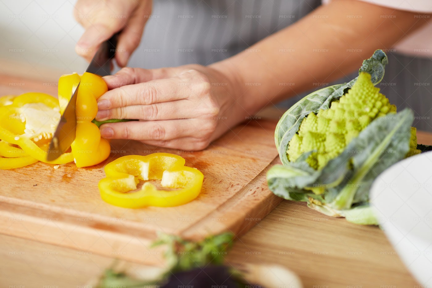 Woman Cutting Pepper: Stock Photos