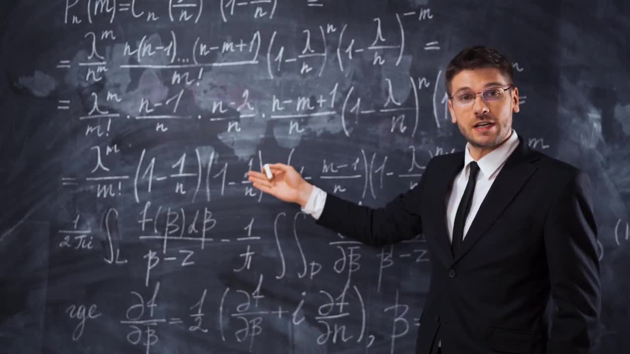 Male Teacher Explaining Math Equation - Stock Video | Motion Array