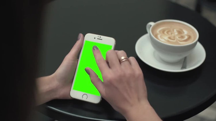 Green Screen Mobile Phone In Cafe : Stock Video
