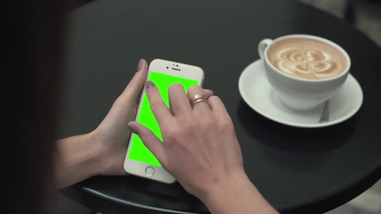 Using Phone While In Cafe: Stock Video
