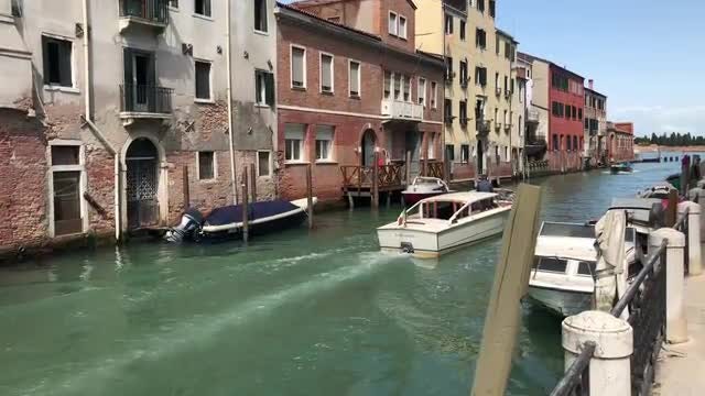 Boat Sailing Through The Canal : Stock Video