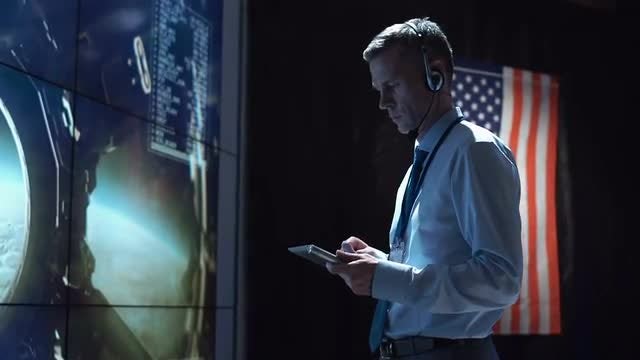 Man Inside Mission Control Center : Stock Video