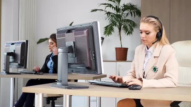 Busy Female Customer Care Employees: Stock Video