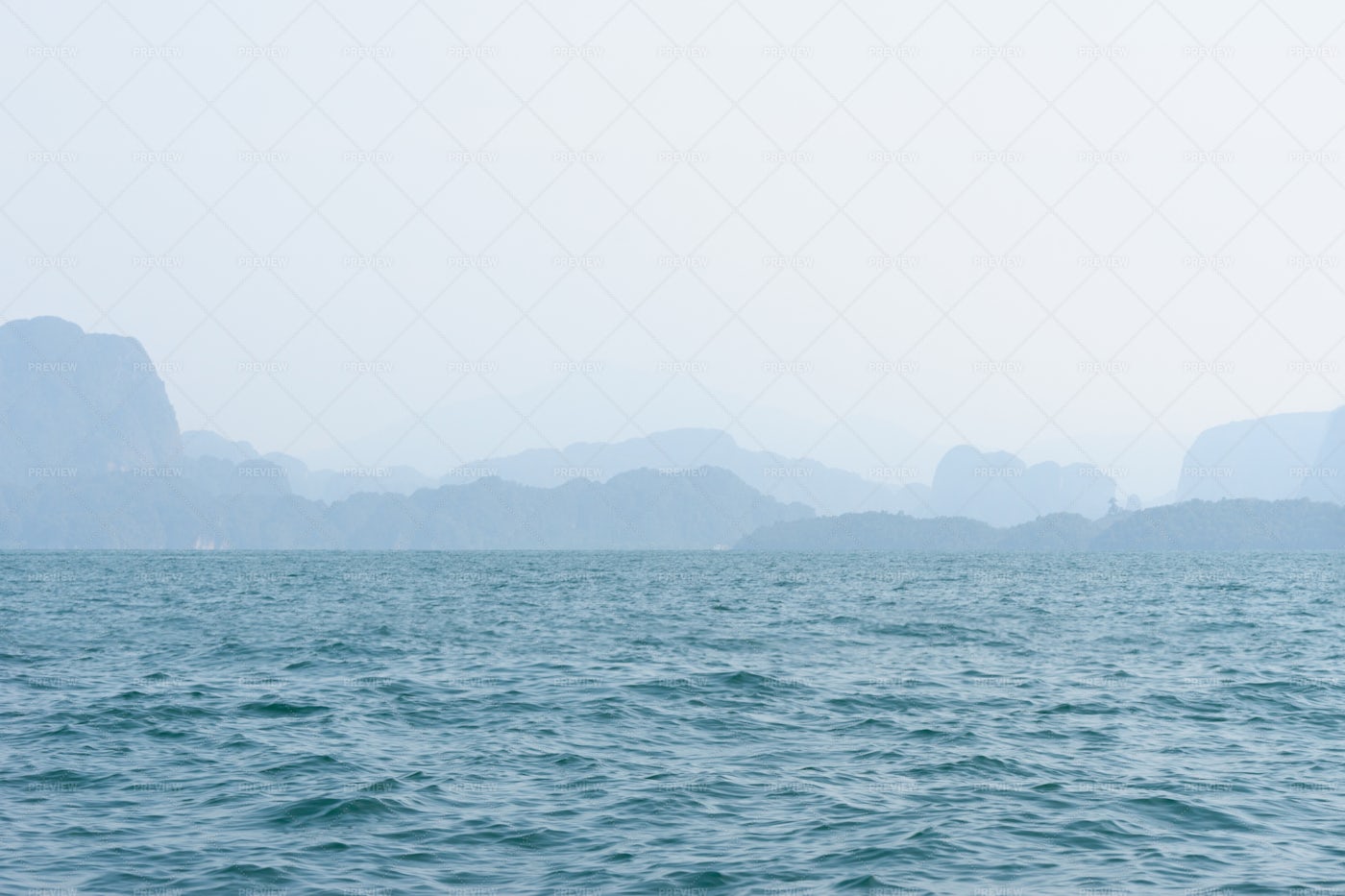 Blue Sea Water And Mountains: Stock Photos