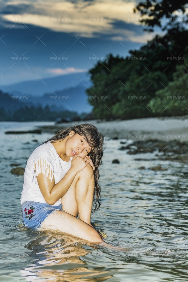 Sitting On A Beach Rock: Stock Photos