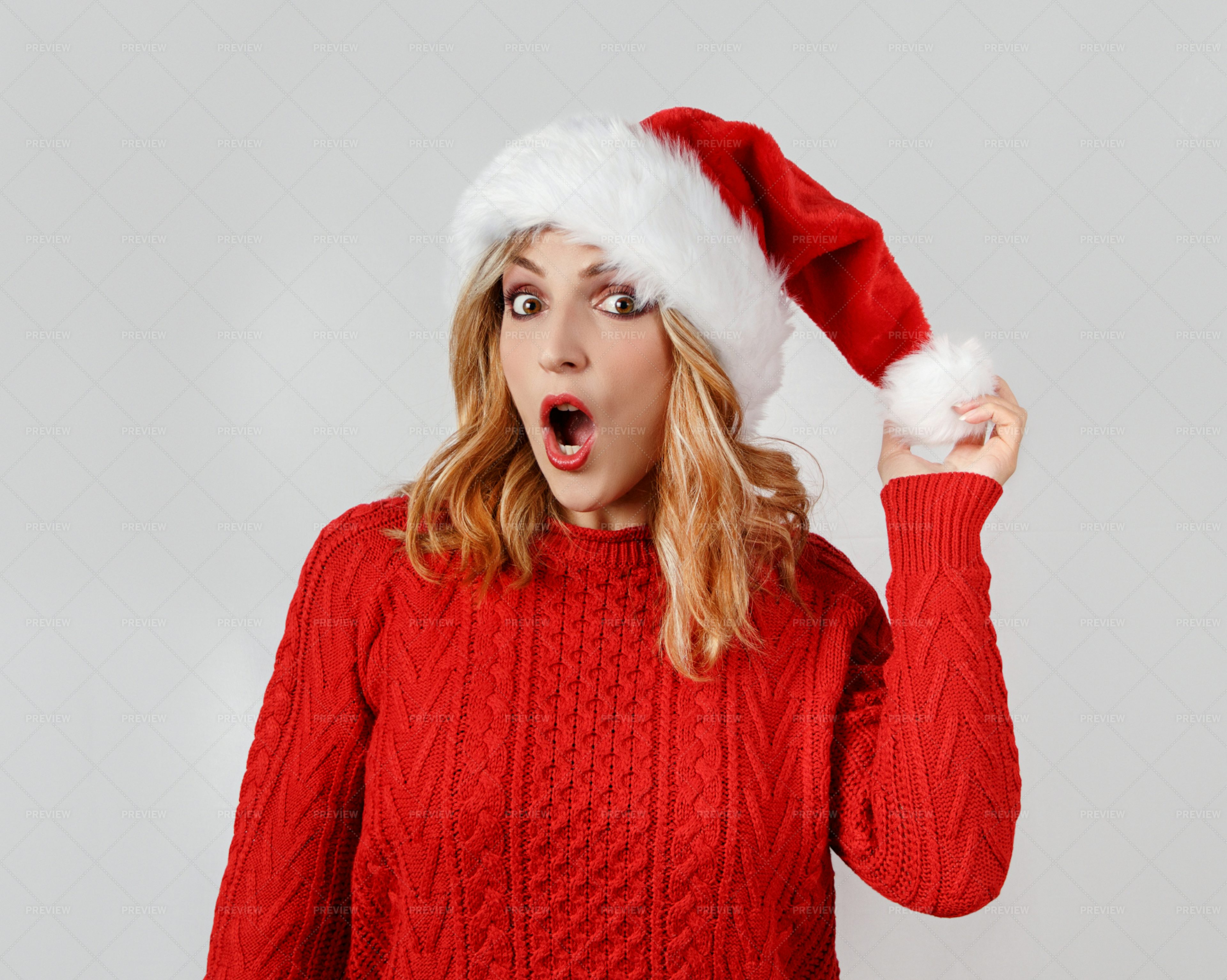 Woman In Christmas Hat - Stock Photos | Motion Array