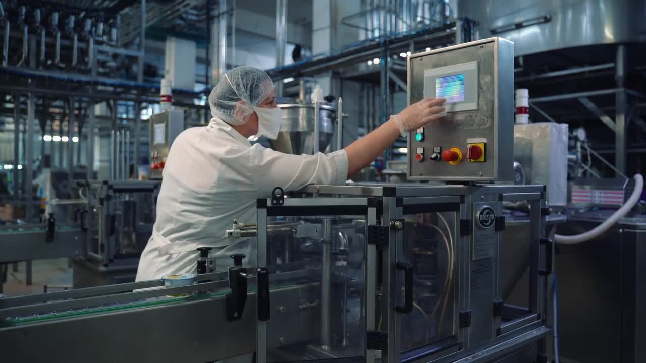 Worker At Yogurt Production Plant Stock Video Motion Array