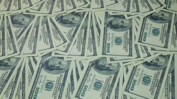 Panning Shot Of Dollar Notes: Stock Video