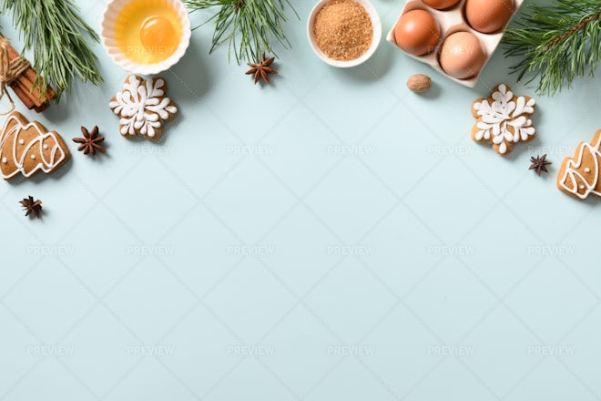 Fresh baked gingerbread cookies in christmas festive shapes on baking tray  in modern white kitchen Stock Photo by Sonyachny