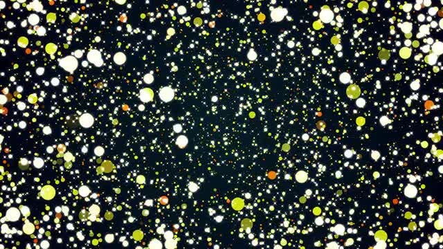 Shimmering Yellow Particles Background: Stock Motion Graphics
