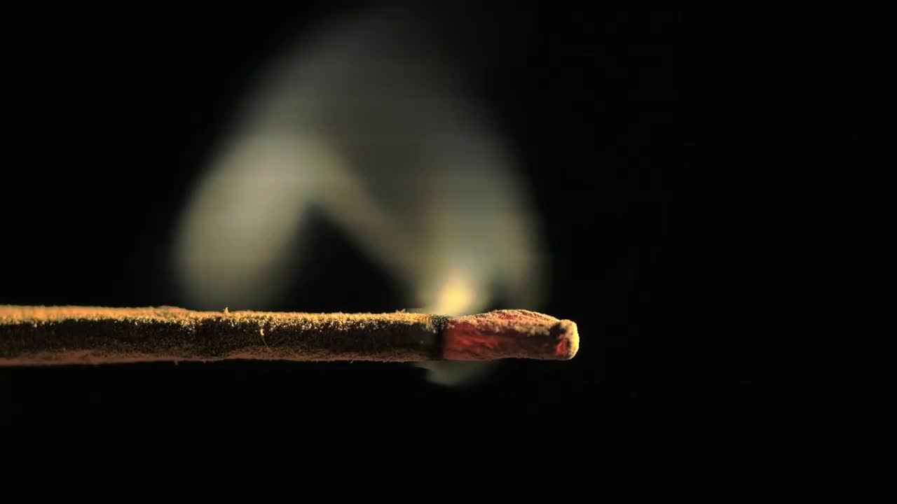 An Incense Stick Burns Stock Video Motion Array