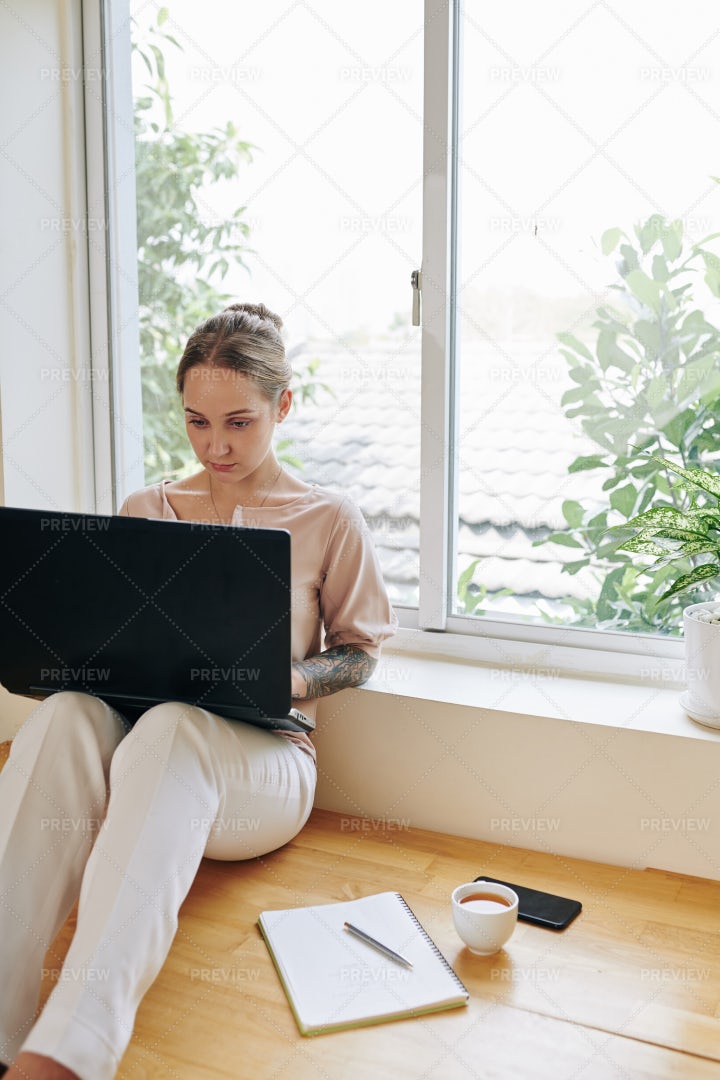 Working On Laptop At Home: Stock Photos